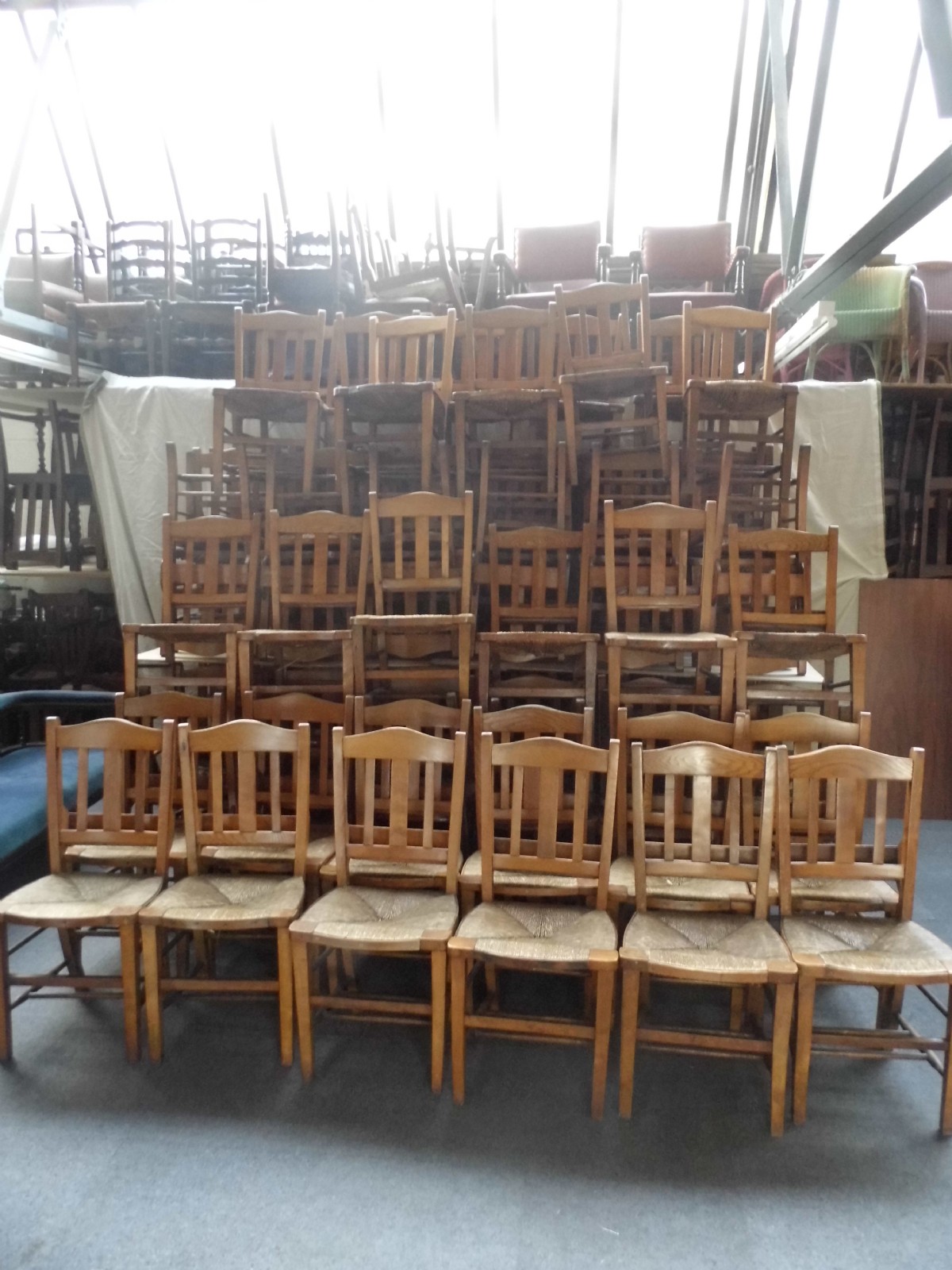 set of 48 chapel chairs