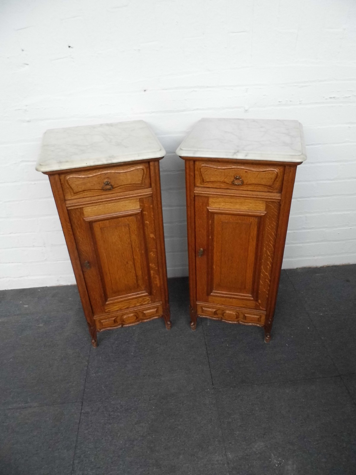pair of french oak bedside cabinets