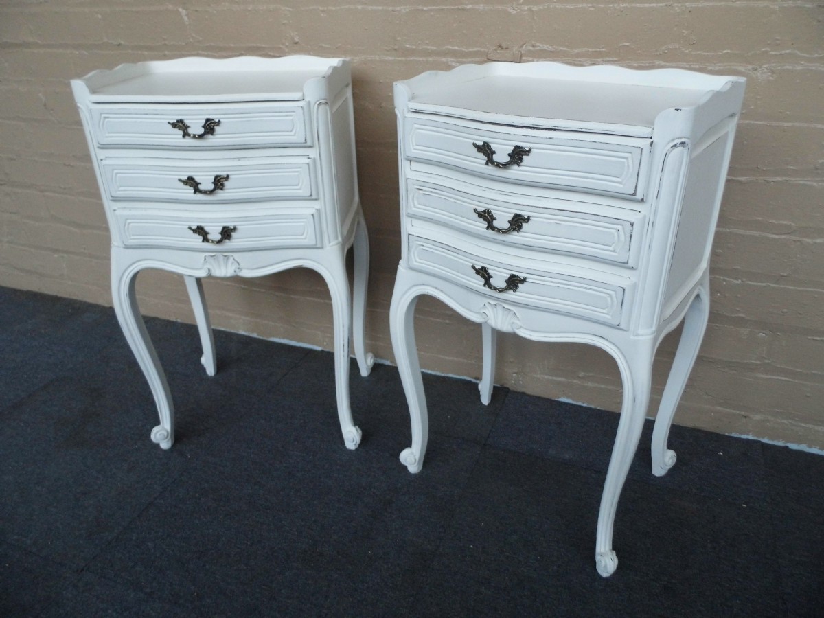 pair of french painted bedside cabinets