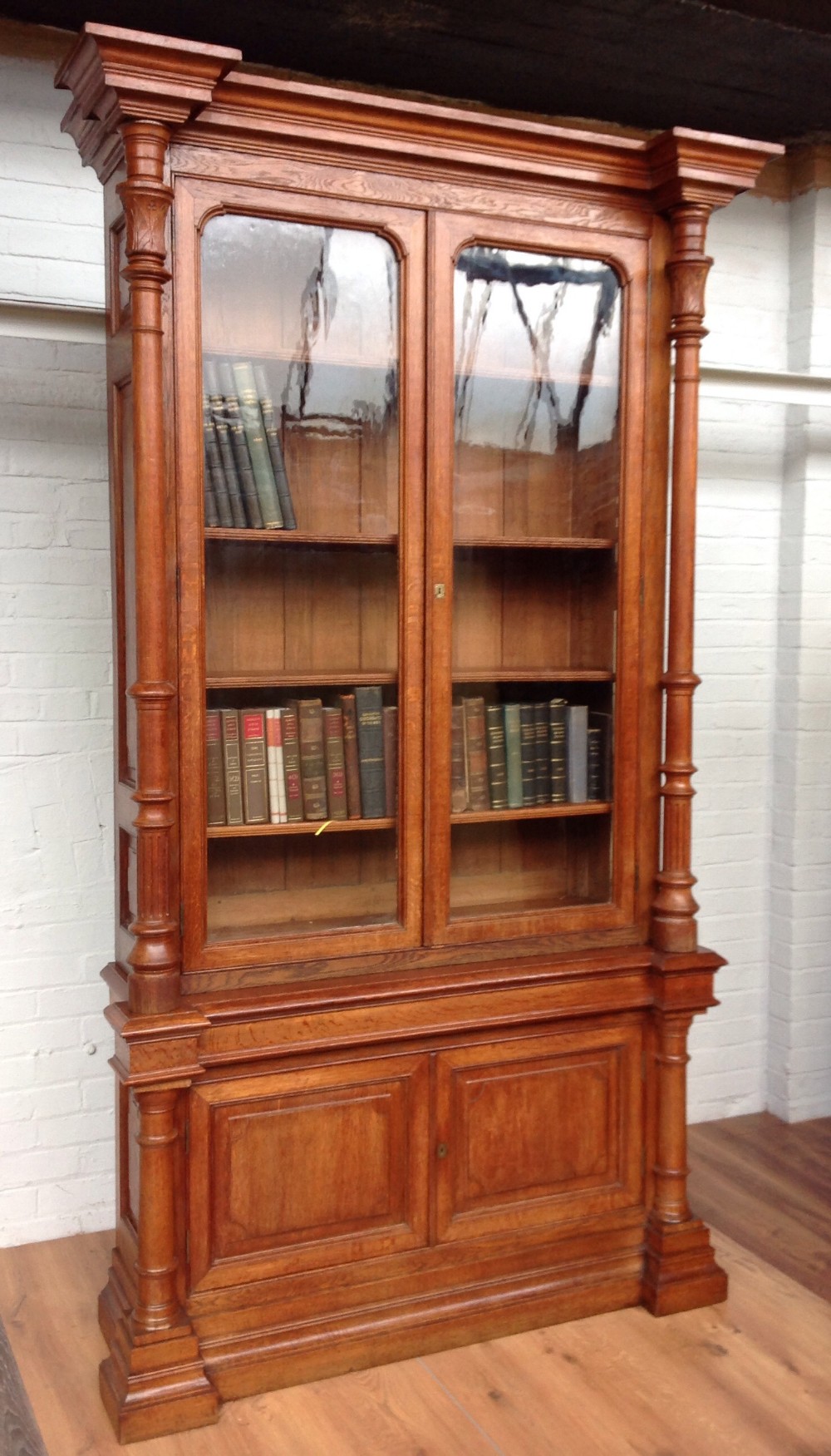 large oak french inverted breakfront bookcase