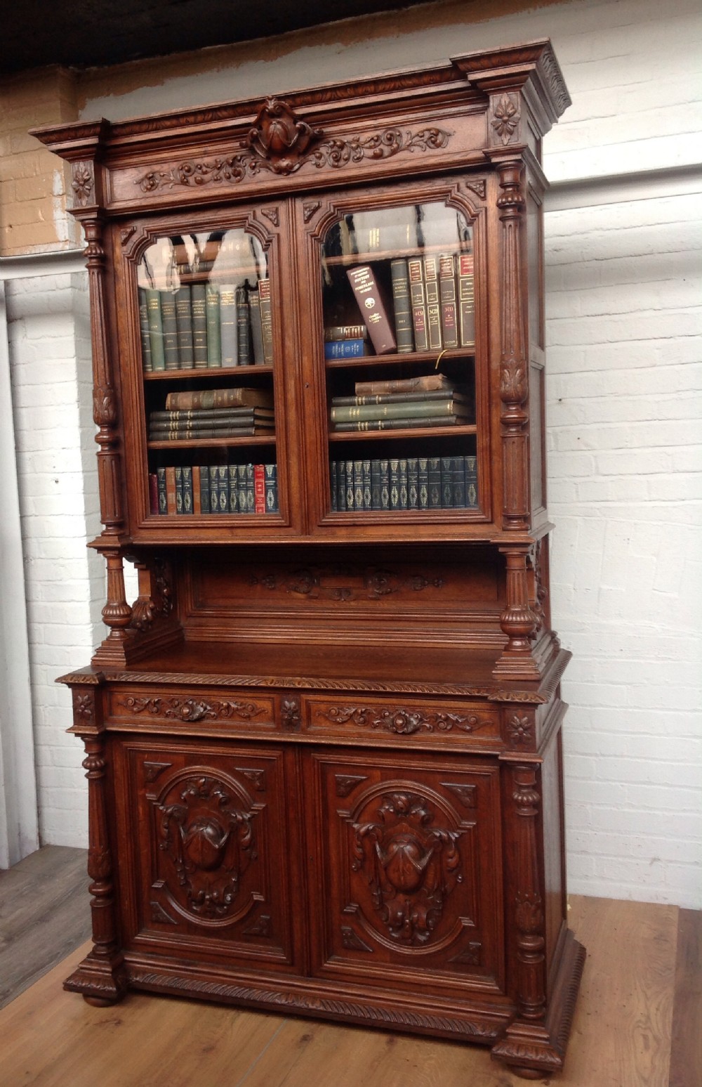 carved oak inverted breakfront french bookcase