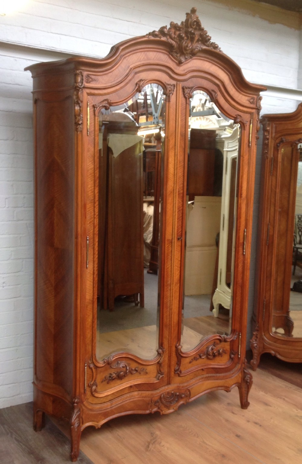 antique french walnut armoire with carved doors
