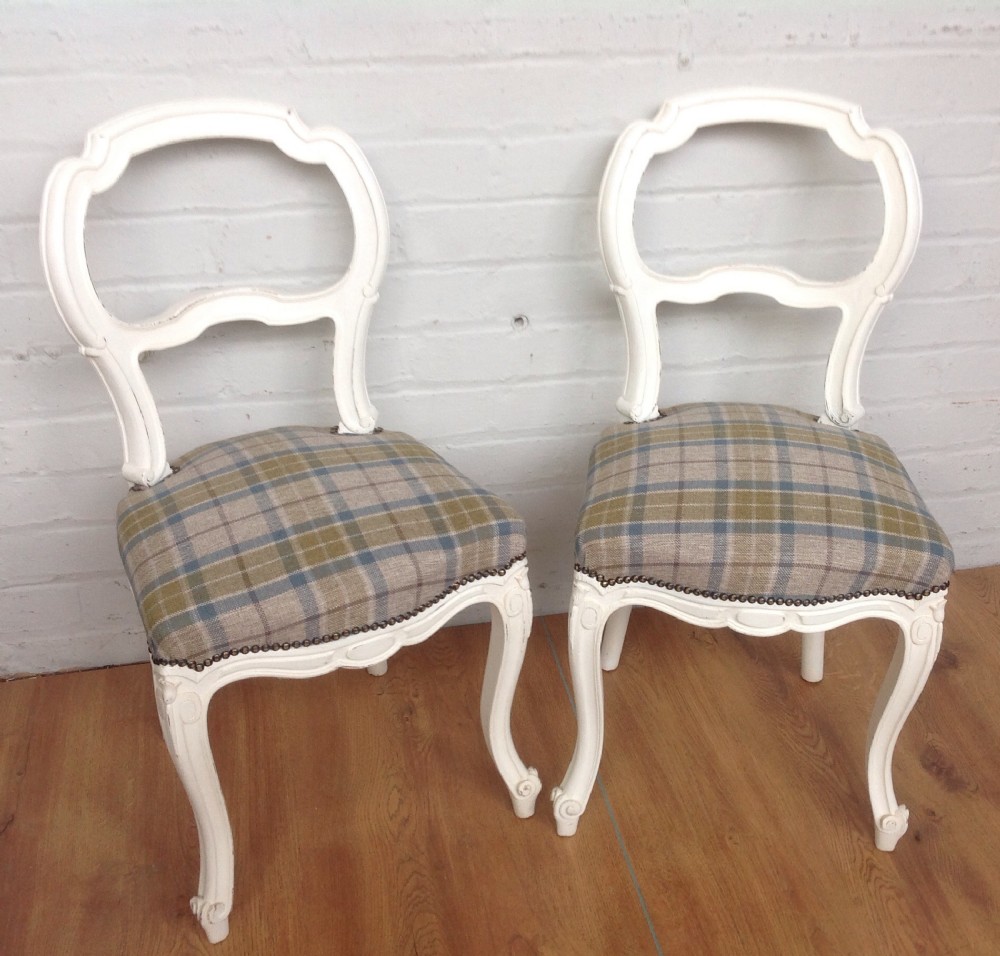 pair of painted french side chairs