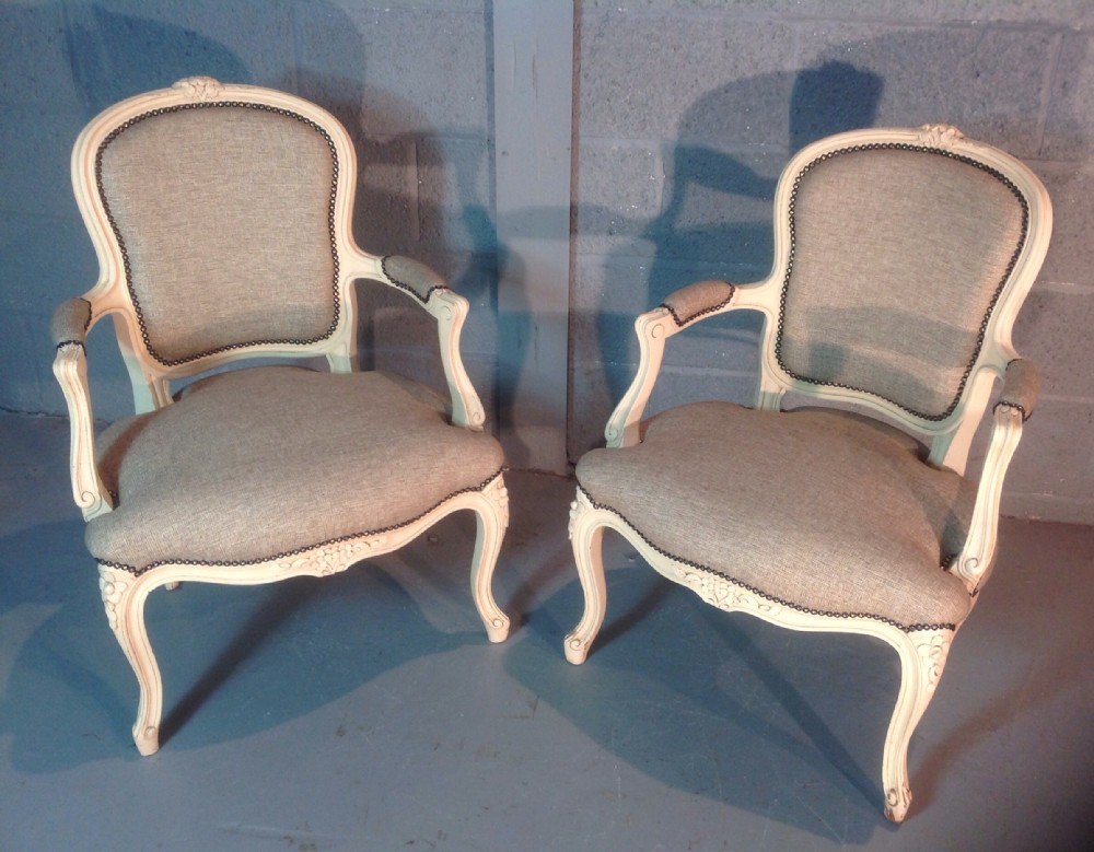 pair of newly upholstered french armchairs