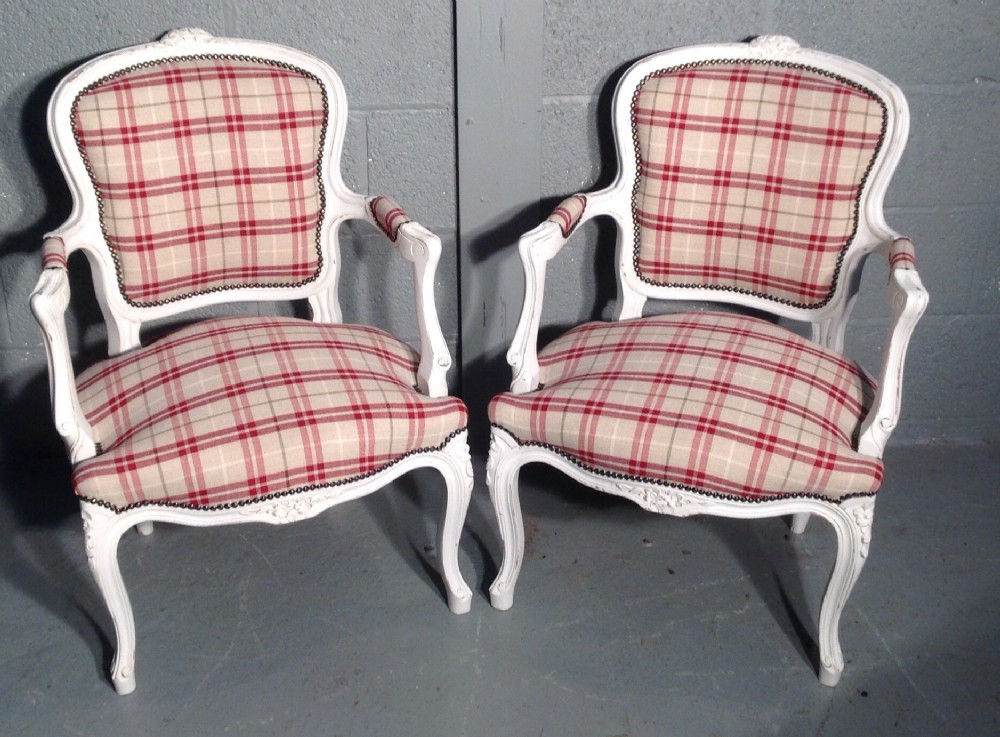 pair of french chairs in red tartan fabric