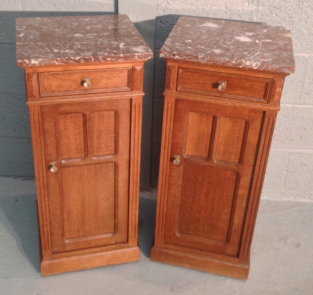 pair of french arts and crafts oak bedside cabinets
