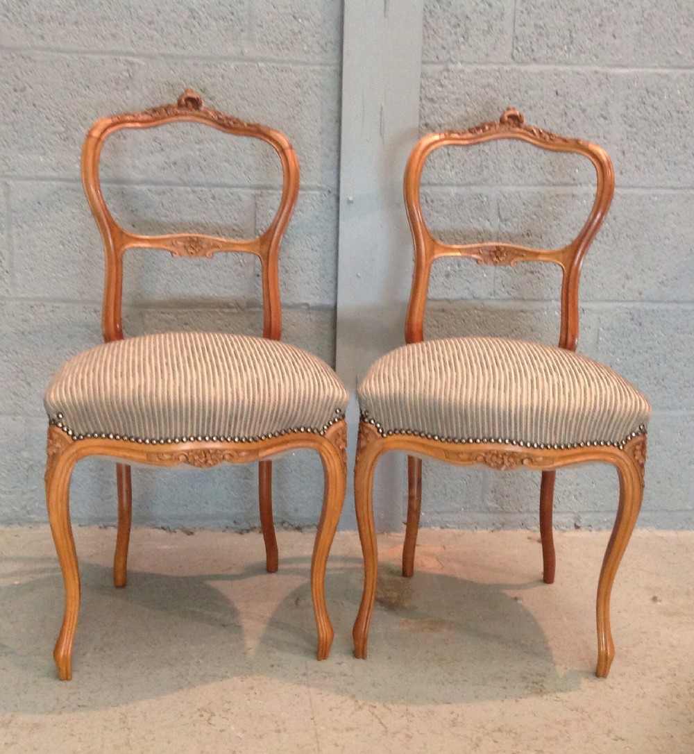 pair of walnut french chairs