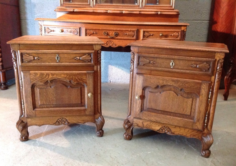 carved oak pair of french bedside cabinets