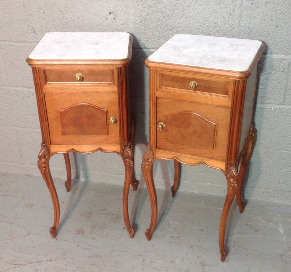 pair of french walnut bedside cabinets