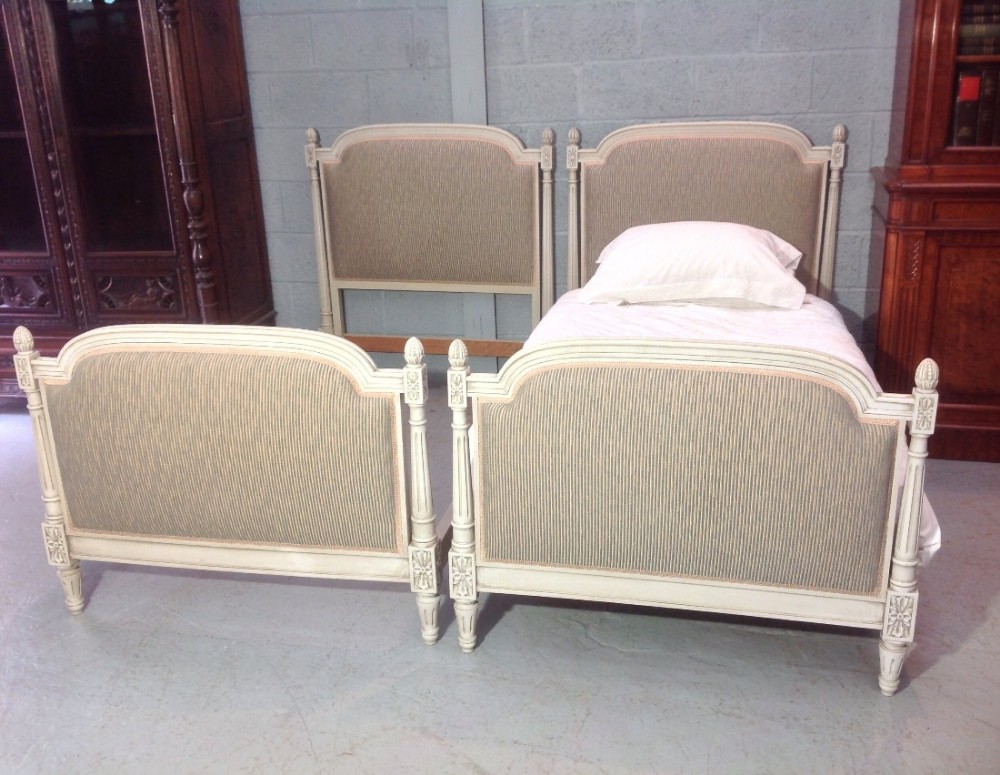 pair of french upholstered single beds