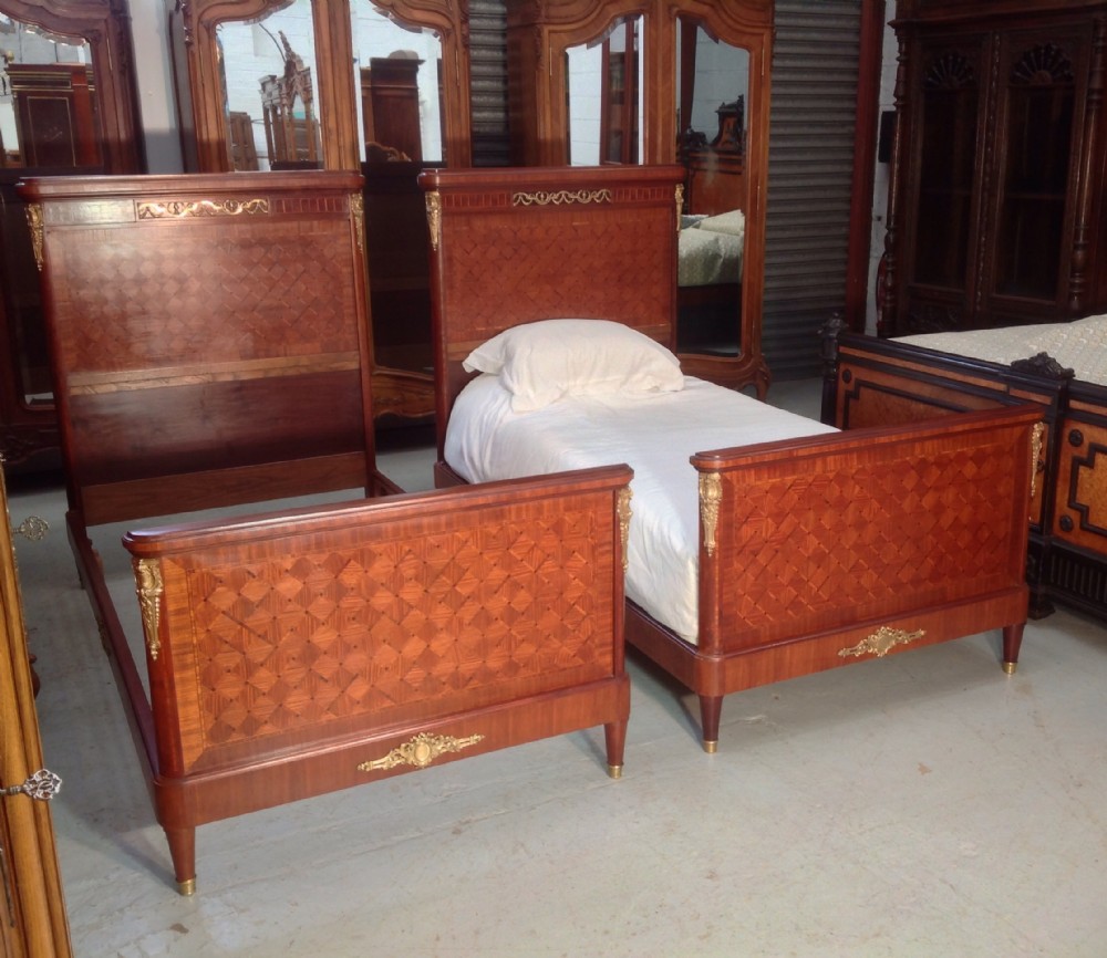 pair of french inlaid single beds