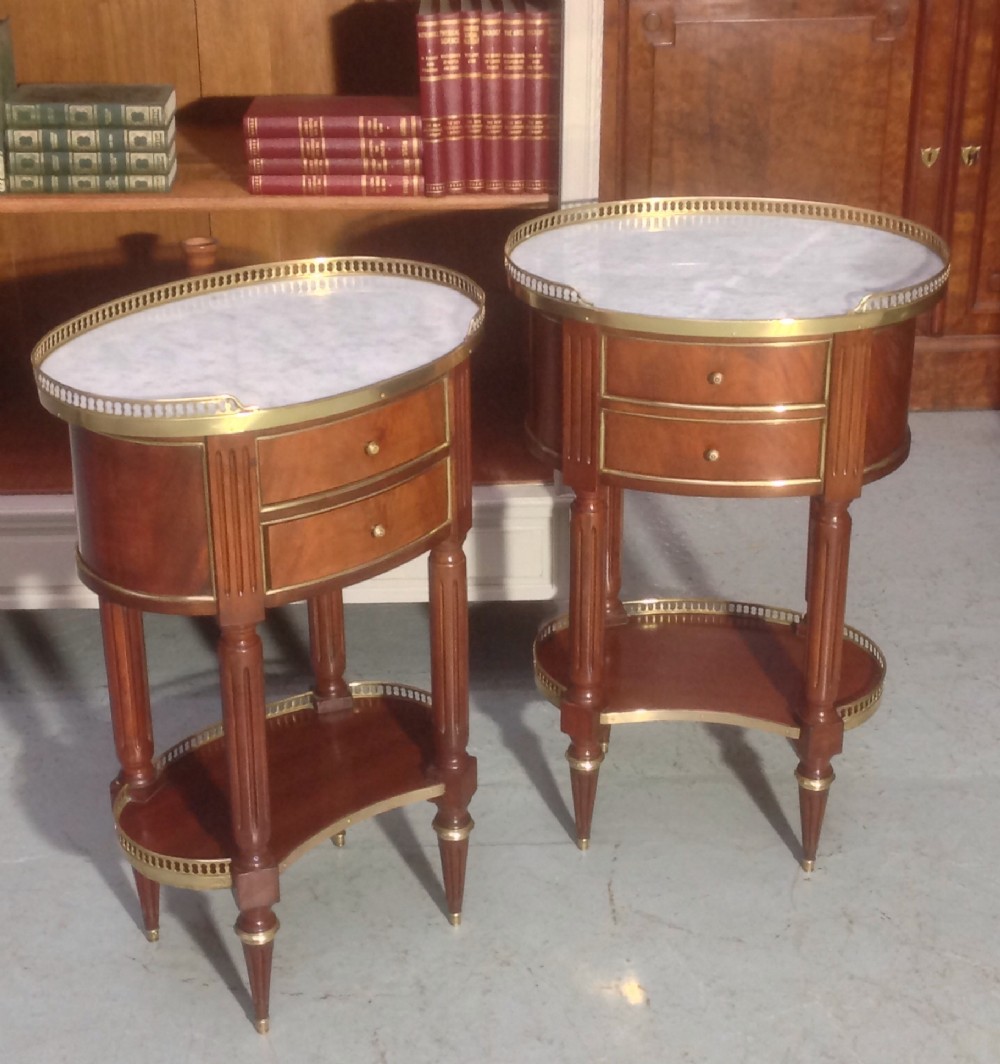 pair of french mahogany and brass bedside cabinets