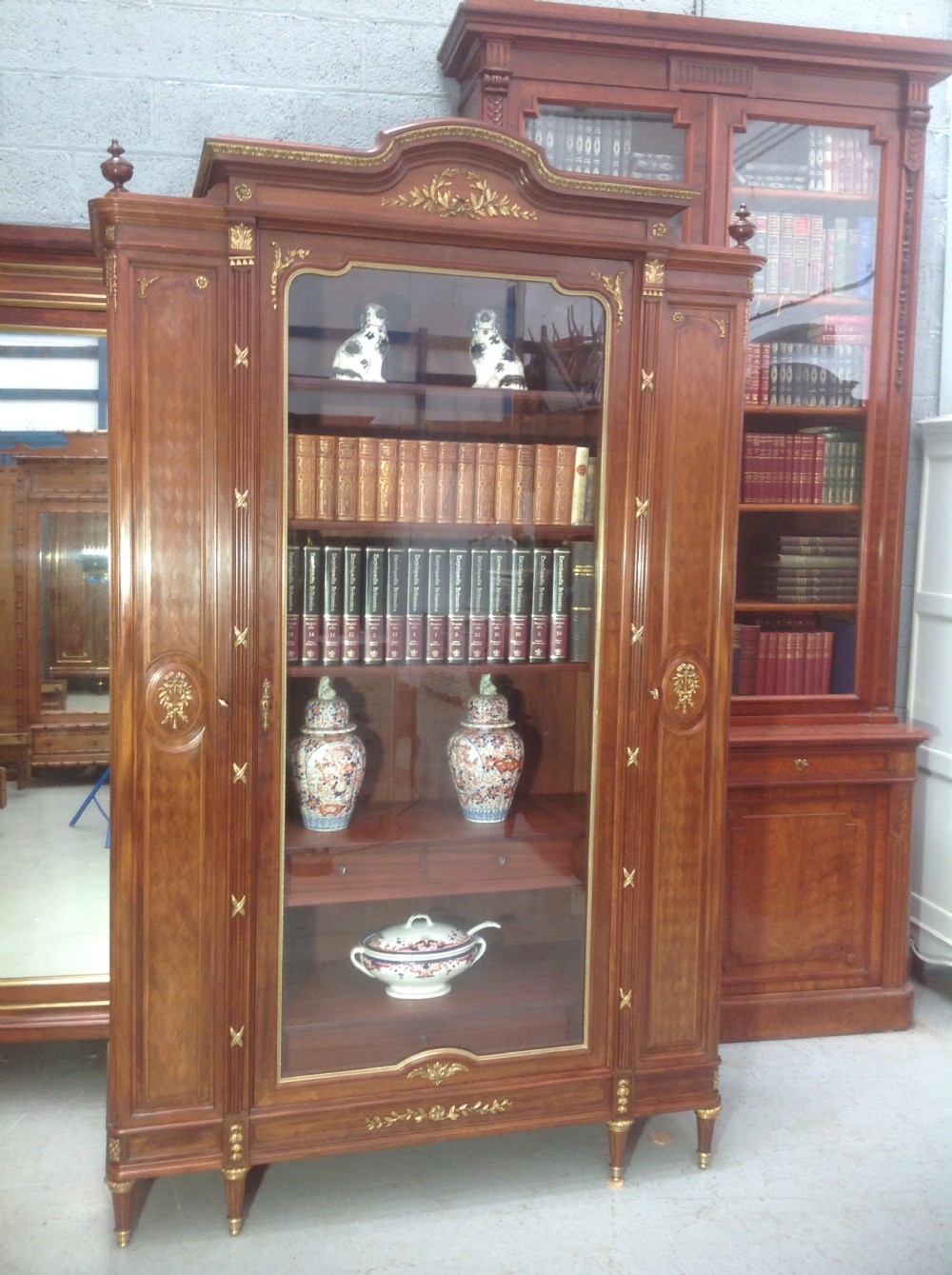 french mahogany and brass bookcase