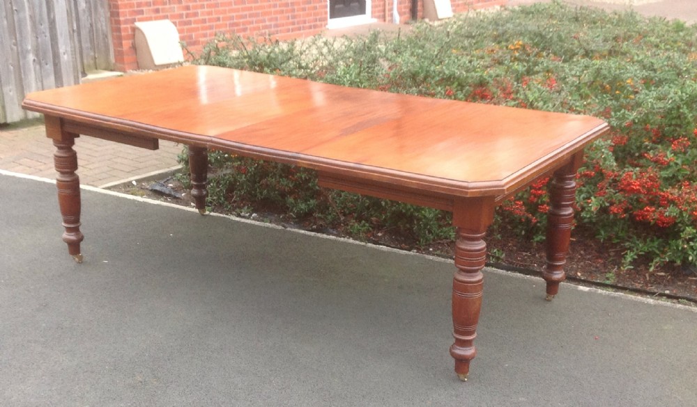 large walnut wind out dining table