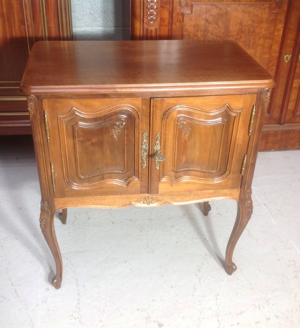 walnut french carved cabinet