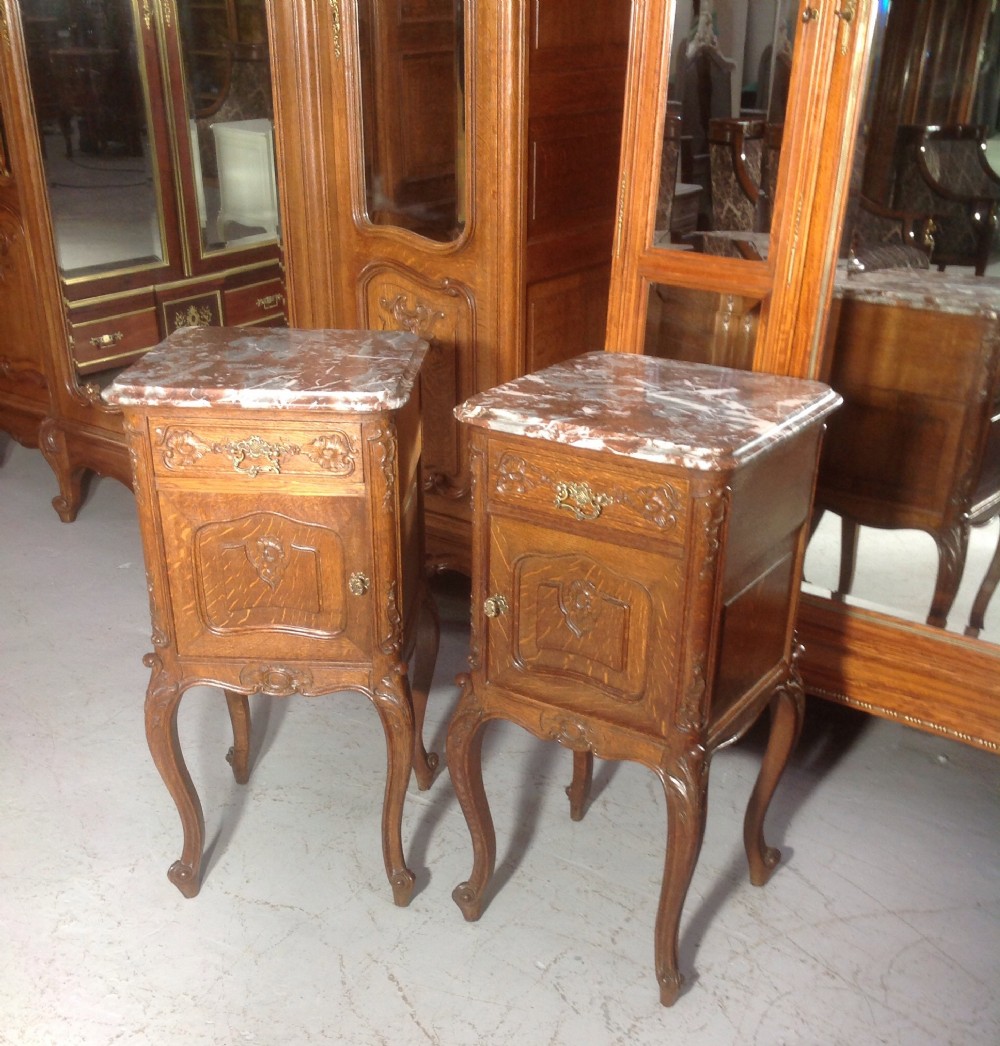 pair of french oak bedside cabinets