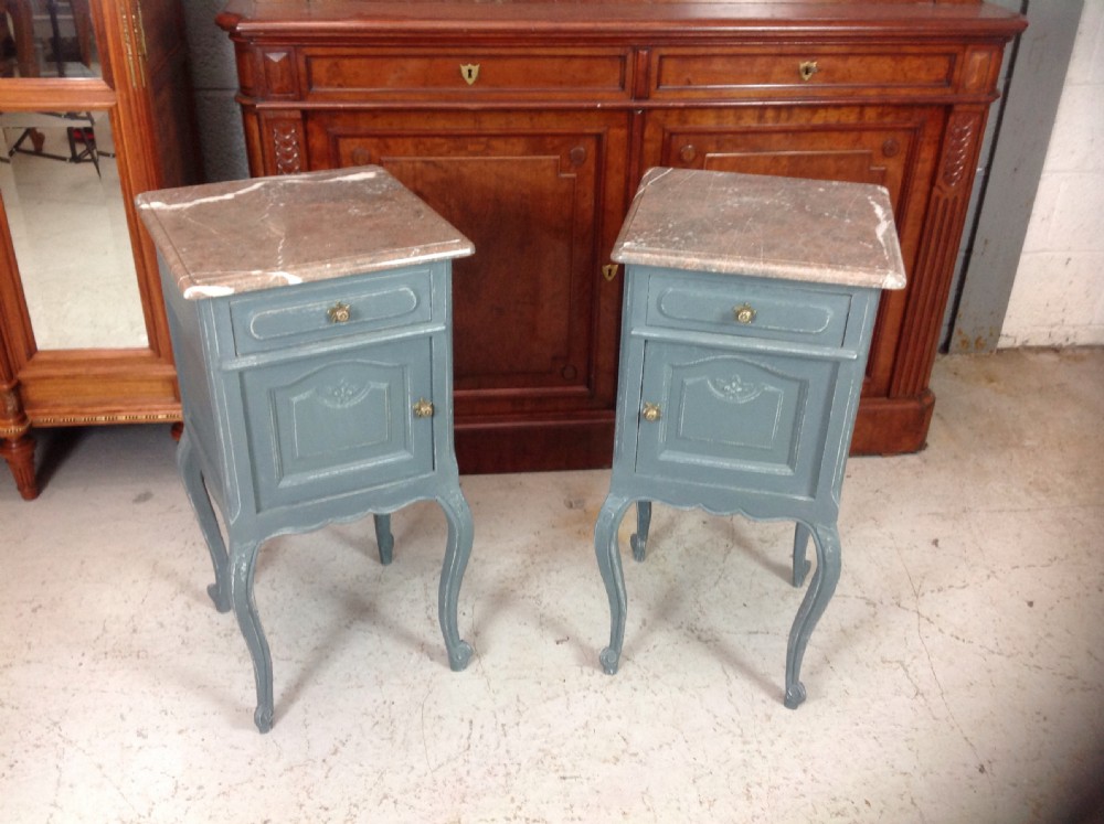 pair of paited french bedside cabinets