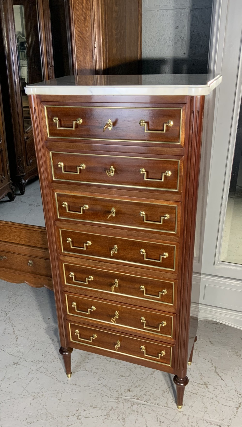 french mahogany semanier chest of drawers
