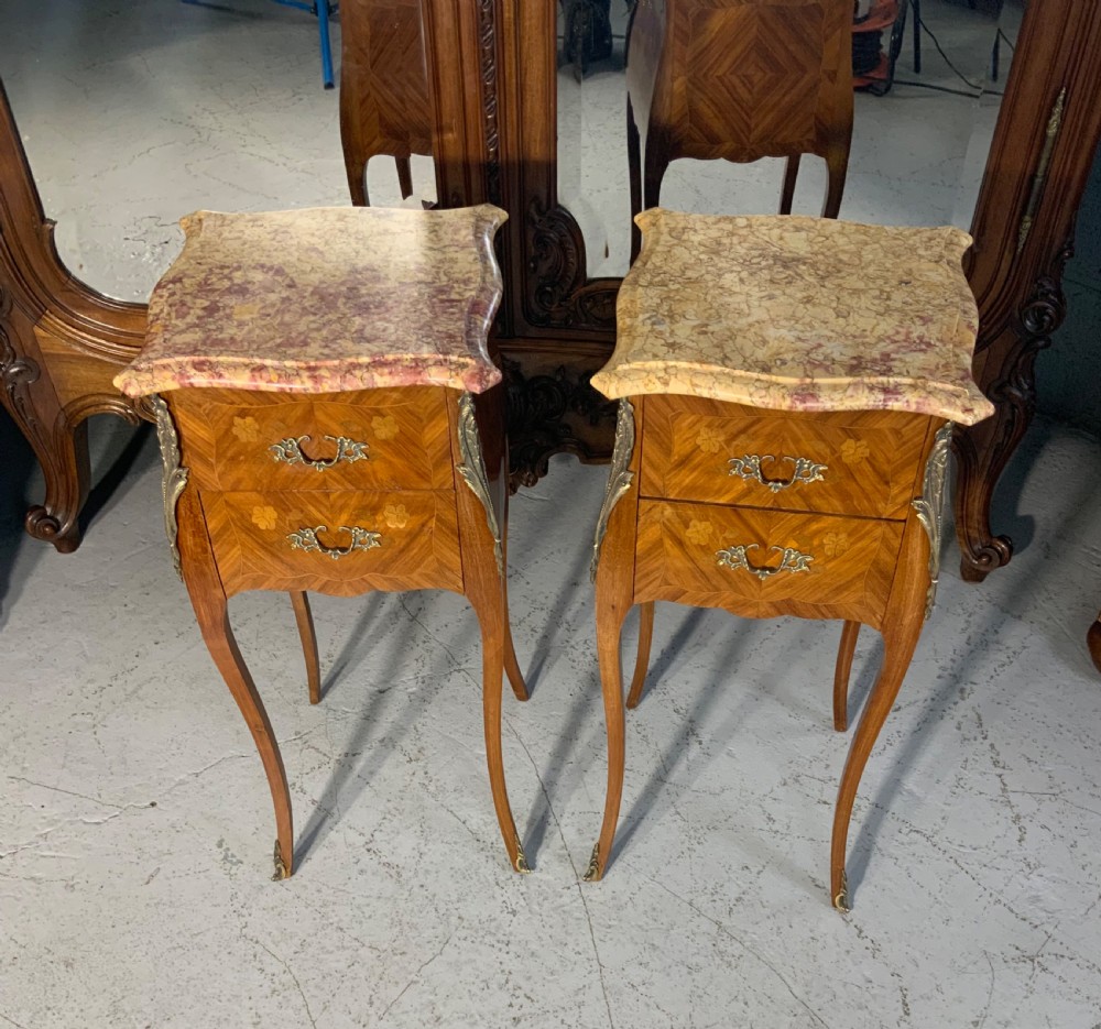 pair of french inlaid marquetry bedside cabinets