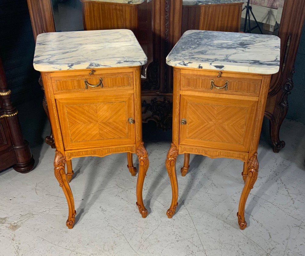 pair of french satinwood bedside cabinets