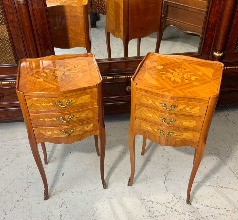 pair of french marquetry bedside cabinets