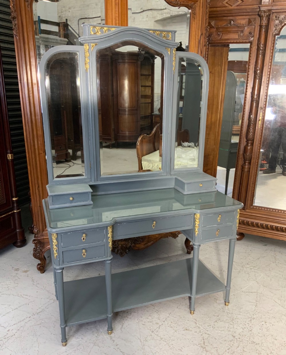 large french dressing table in plummet grey with brass embellishments