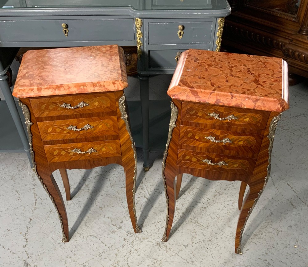 pair of french marquetry bedside cabinets