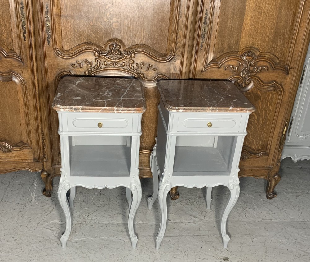 pair of french painted bedside cabinets