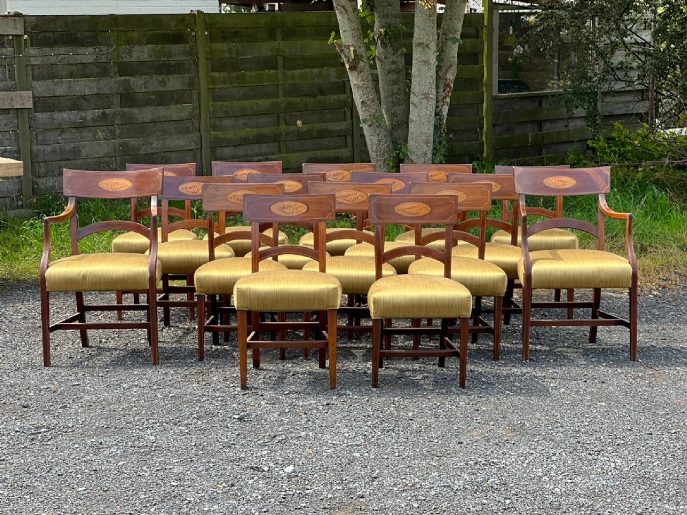 set of 16 georgian mahogany dining chairs with shell inlays