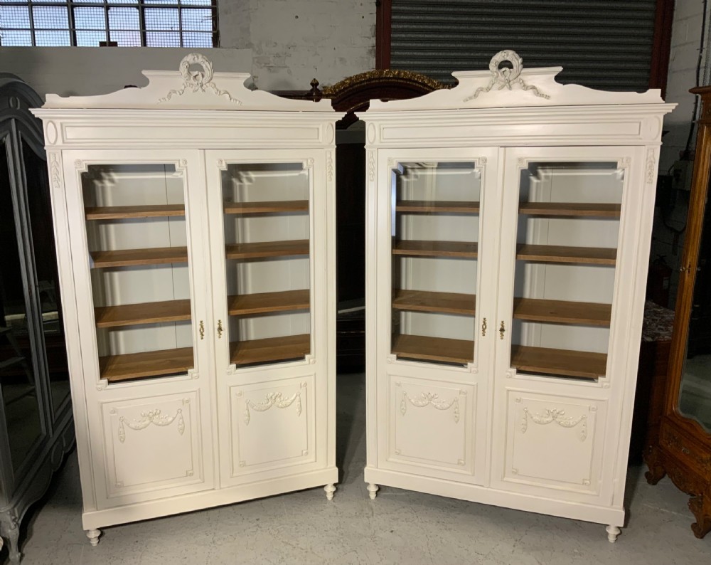 matching pair of painted french bookcases