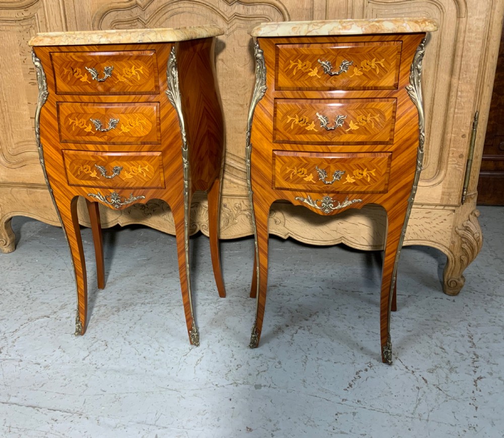 pair of french marquetry bedside cabinets