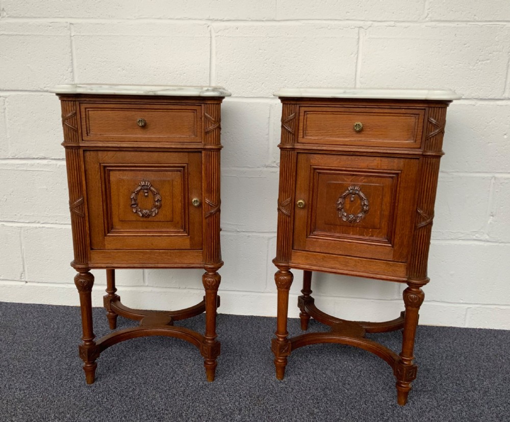 pair of french oak bedside cabinets