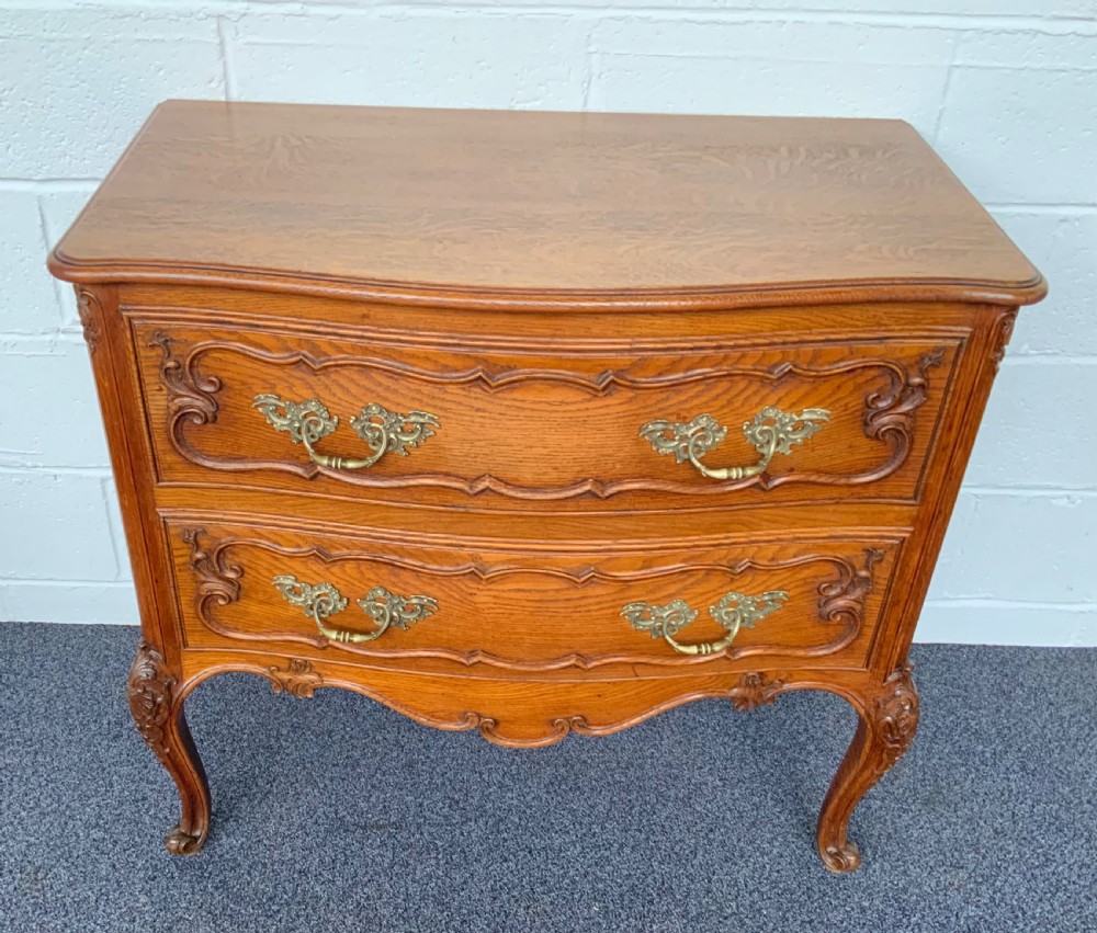carved oak french bow front chest of drawers