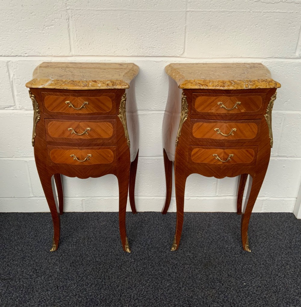 pair of french marquetry bedside cabinets