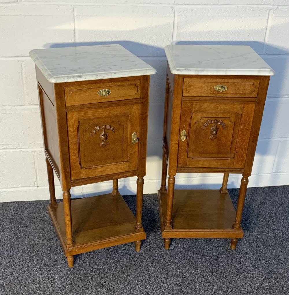 pair of french oak bedside cabinets