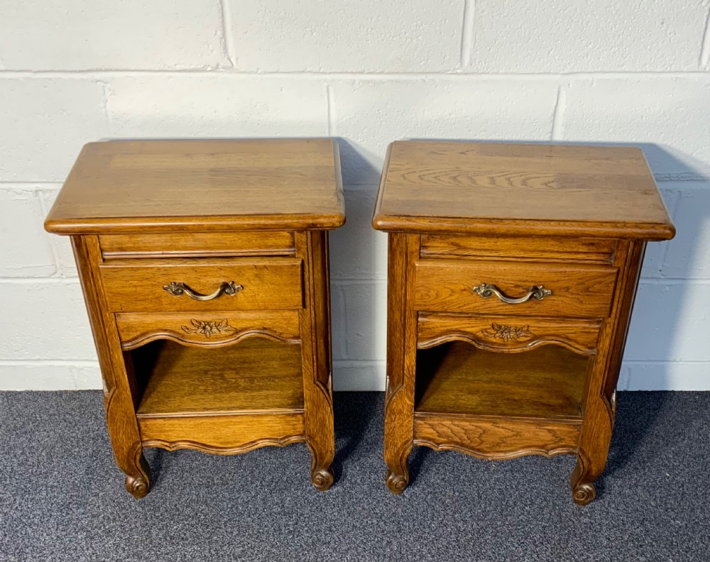 pair of french oak bedside cabinets