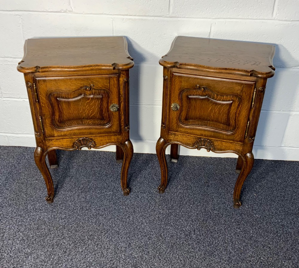 pair of french oak bedside cabinets