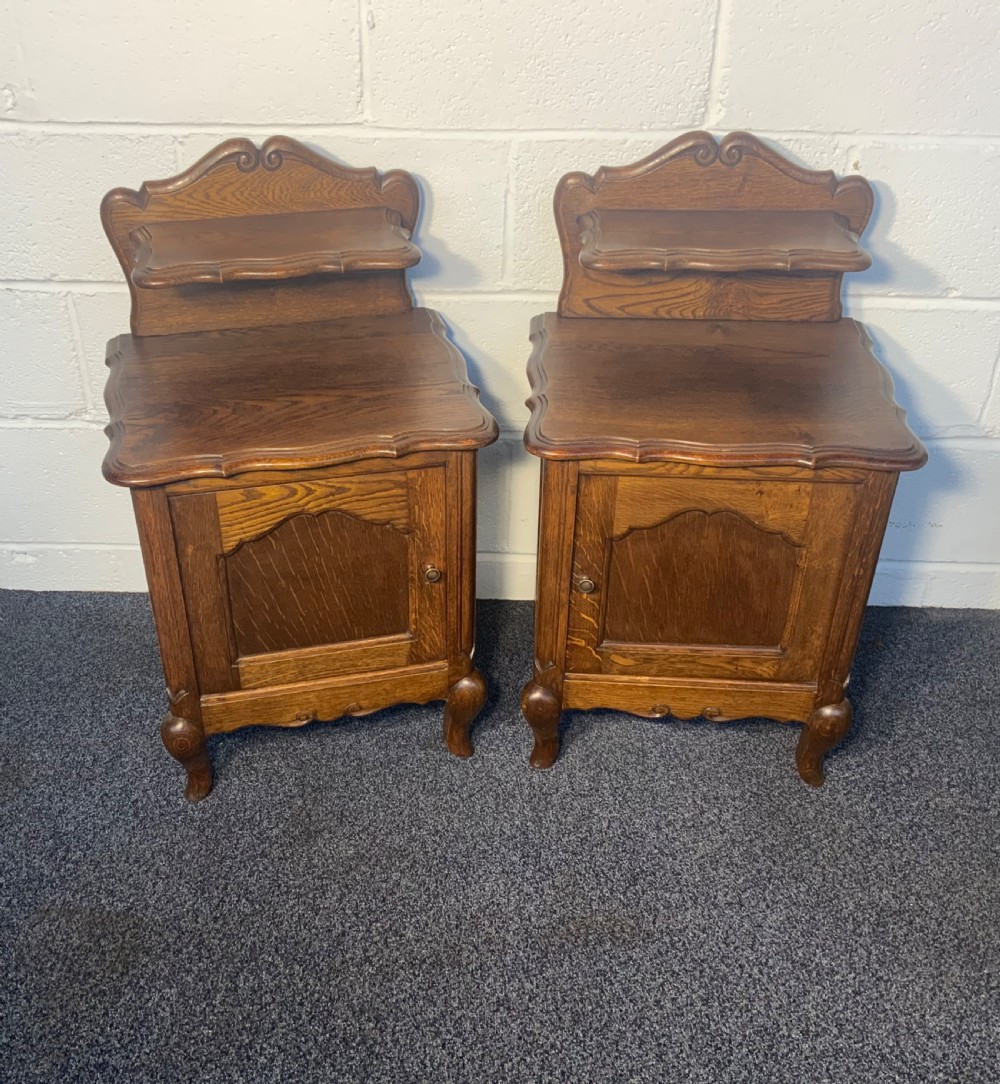 pair of french oak bedside cabinets