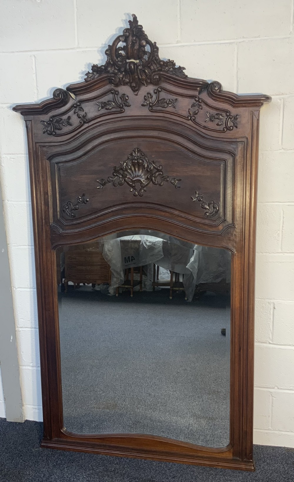 carved walnut trumeau mirror