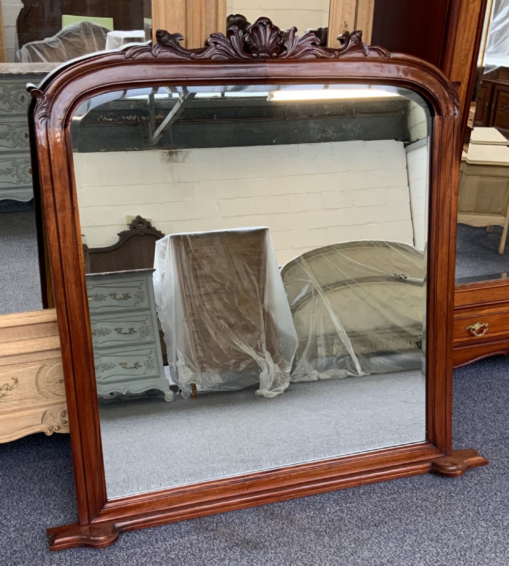 carved walnut framed french mirror