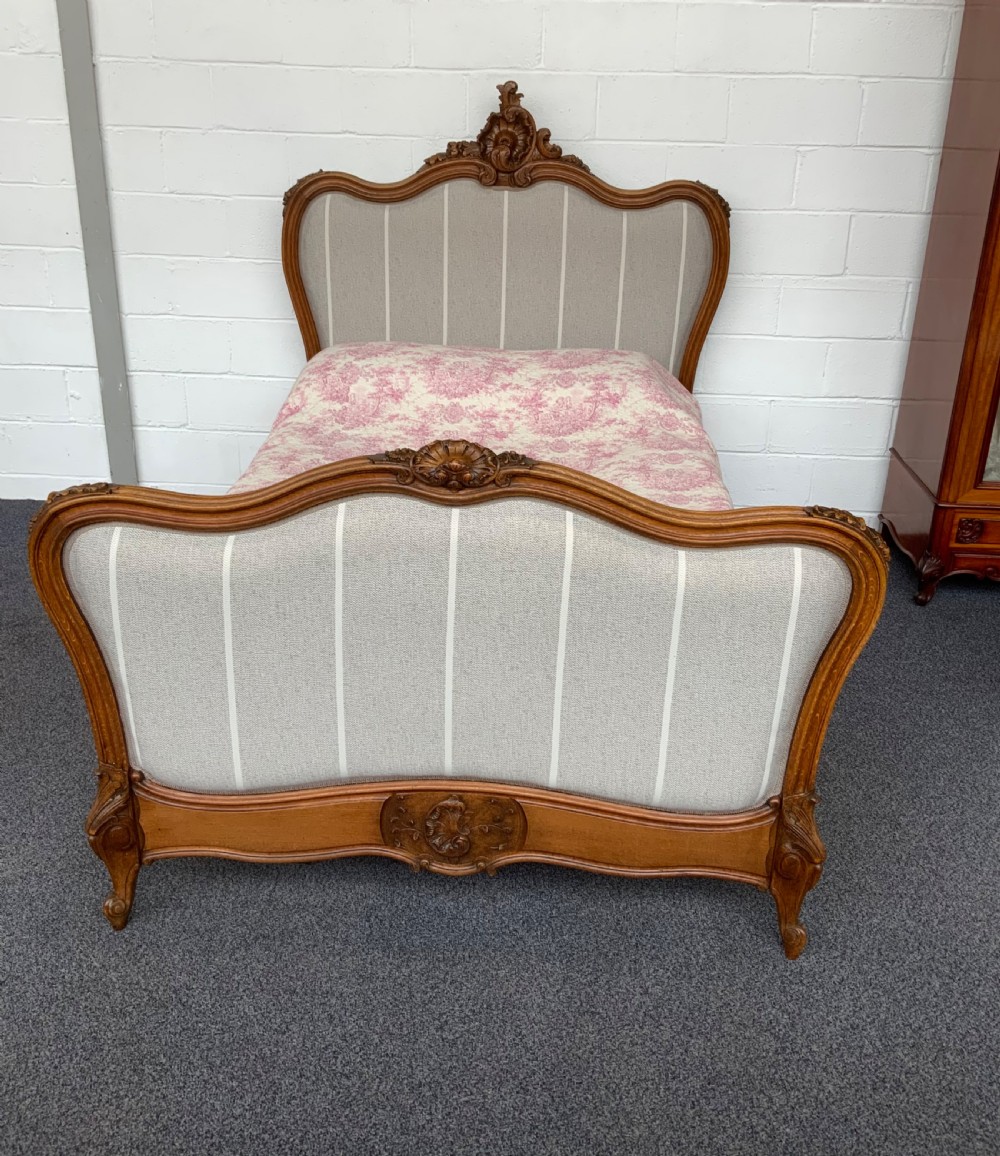 newly upholstered french bed
