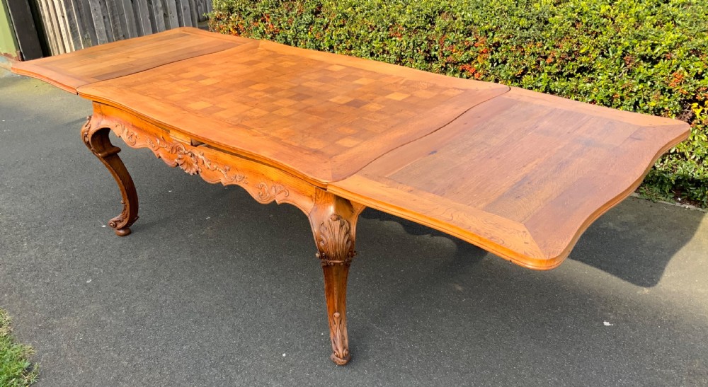 large carved french draw leaf table