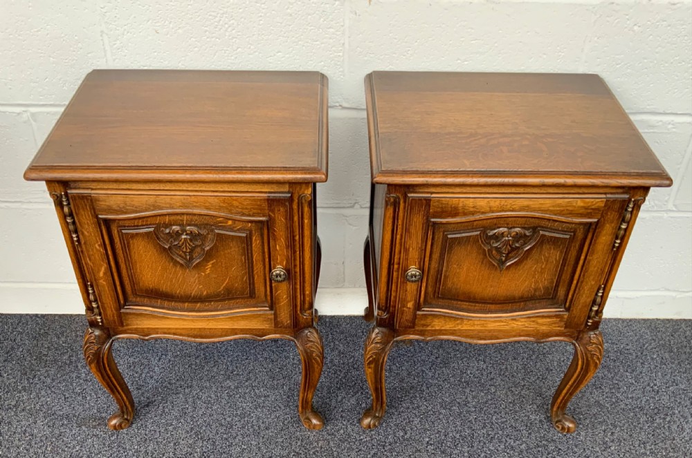 pair of oak french bedside cabinets