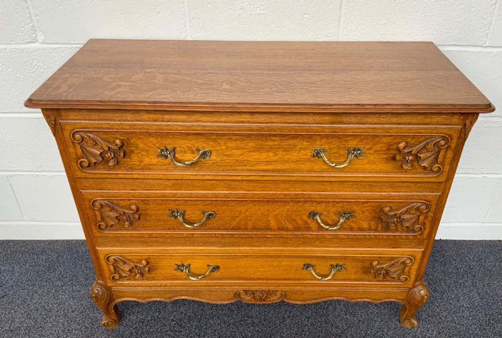 carved oak french chest of drawers