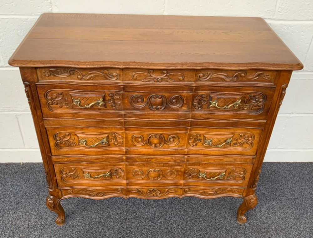 carved oak french chest of drawers