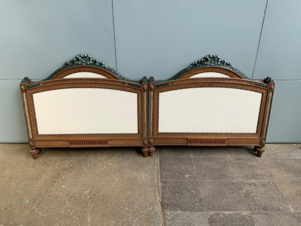 pair of french single oak beds