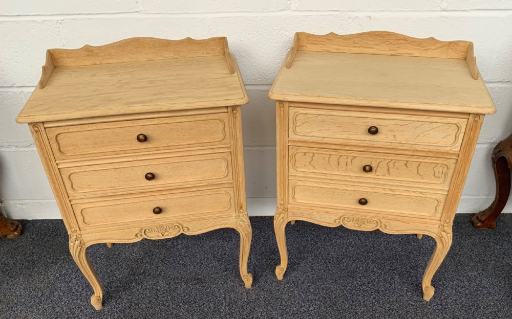 pair of bleached oak french bedside cabinets